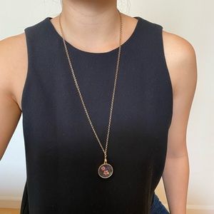 Long necklace with pressed flower pendant